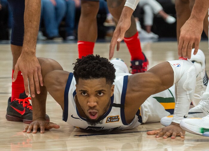 (Rick Egan  |  The Salt Lake Tribune)     Donovan Mitchell's gets off the flour after being fouled, in NBA action between the Utah Jazz and the Washington Wizards, in Salt Lake City, Friday, February 28, 2020