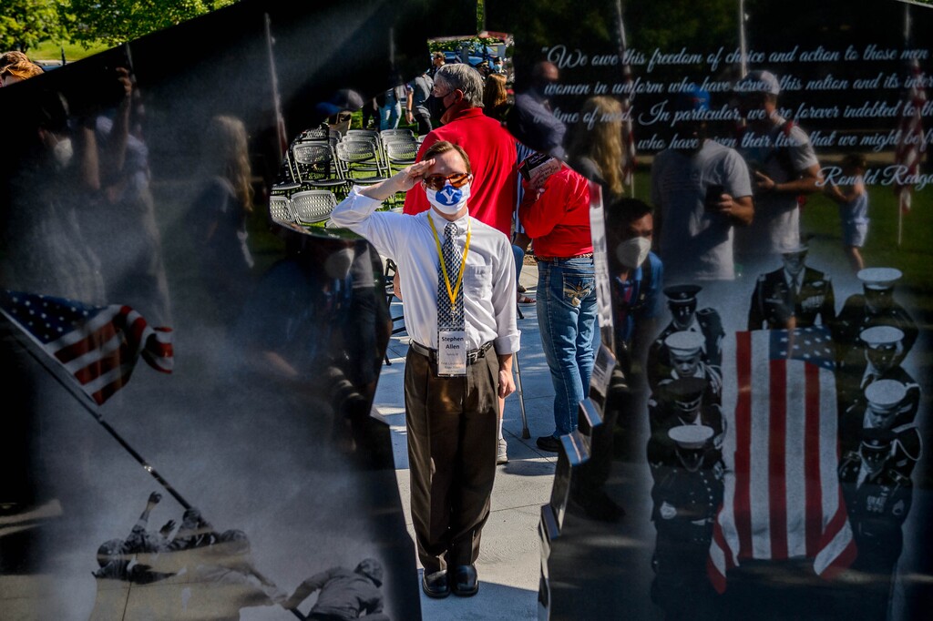 (Trent Nelson  |  The Salt Lake Tribune) Stephen Allen, brother of fallen fighter pilot Kenneth 'Kage' Allen, salutes the new Gold Star Families Memorial Monument after its unveiling in North Ogden on Saturday, Aug. 1, 2020.
