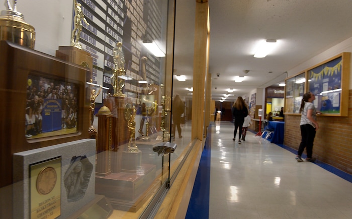 (Leah Hogsten | The Salt Lake Tribune) The trophy cases lining the halls of the high school are filled with longtime Pirate pride as Utah's oldest high school. Cyprus High School has grown and changed since the gym and what may be the state's oldest operating indoor pool were constructed in 1955. A new school is in the works, badly needed to accommodate a growing population on the west side's close-knit community, where long-time fans show up no matter how good or bad the Pirates are.
