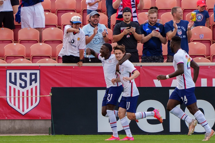 (Trent Nelson  |  The Salt Lake Tribune) United States forward Tim Weah and United States forward Brenden Aaronson celebrate Aaronson's goal. as the U.S. Men’s National Team (USMNT) faces Costa Rica in a friendly at Rio Tinto Stadium in Sandy on Wednesday, June 9, 2021. At right is United States forward Daryl Dike.