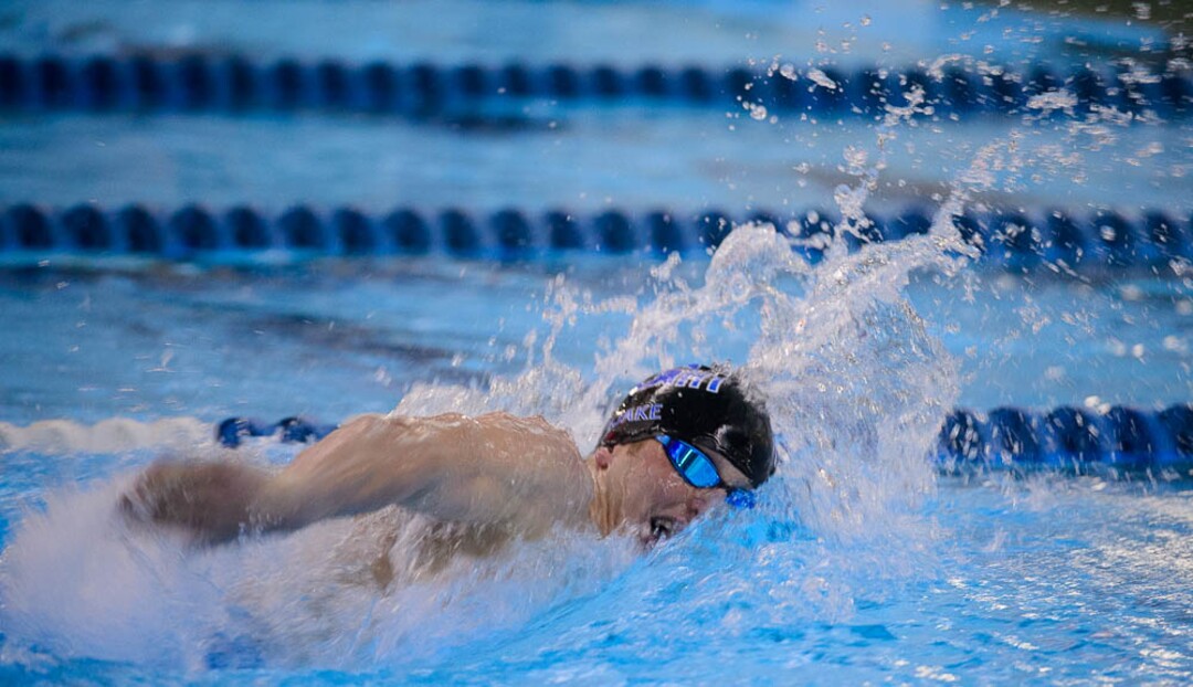 (Trent Nelson | The Salt Lake Tribune)  Pleasant Grove High School's Devin Bunnell wins the Men 200 Yard Freestyle at the high school swimming 6A State Championships in Bountiful, Thursday February 8, 2018.