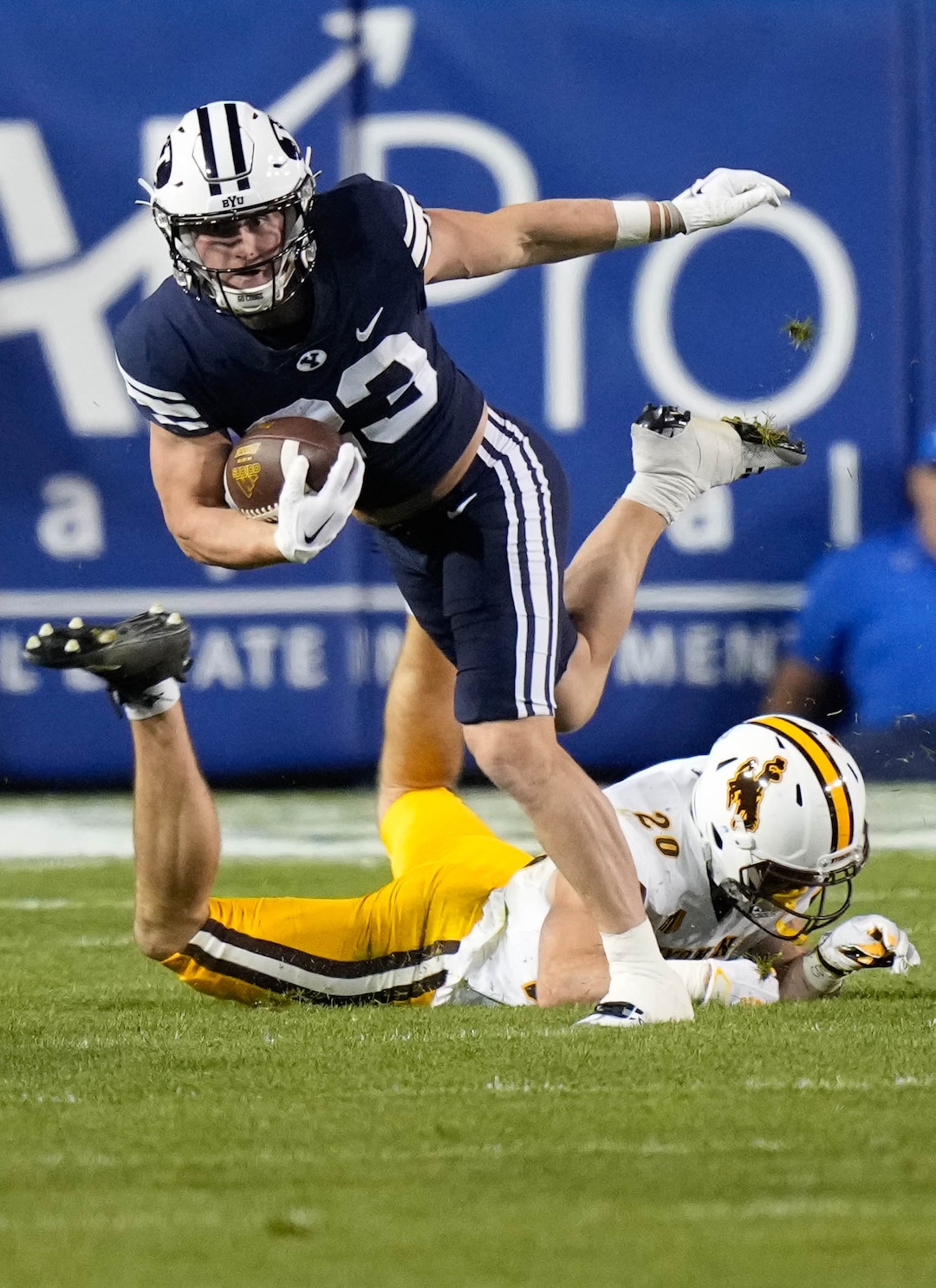 (Francisco Kjolseth | The Salt Lake Tribune) Brigham Young Cougars wide receiver Hobbs Nyberg (23) manages to gets past Wyoming Cowboys wide receiver Ryan Marquez (20)  in football action between the Brigham Young Cougars and the Wyoming Cowboys at LaVell Edwards Stadium in Provo, on Saturday, Sept. 24, 2022.