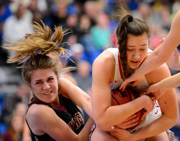 (Trent Nelson | The Salt Lake Tribune)  Viewmont's Emma Carr (2) and East's Lealani Falatea (3) grapple for the ball as East faces Viewmont in the 5A High School Girls' Basketball Tournament at SLCC in Taylorsville, Wednesday Feb. 21, 2018.