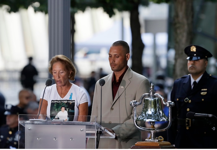 (Mark Lennihan | AP Photo) The names are read of victims of the Sept. 11 attacks during a ceremony marking the 18th anniversary at the National September 11 Memorial, Wednesday, Sept. 11, 2019 in New York.
