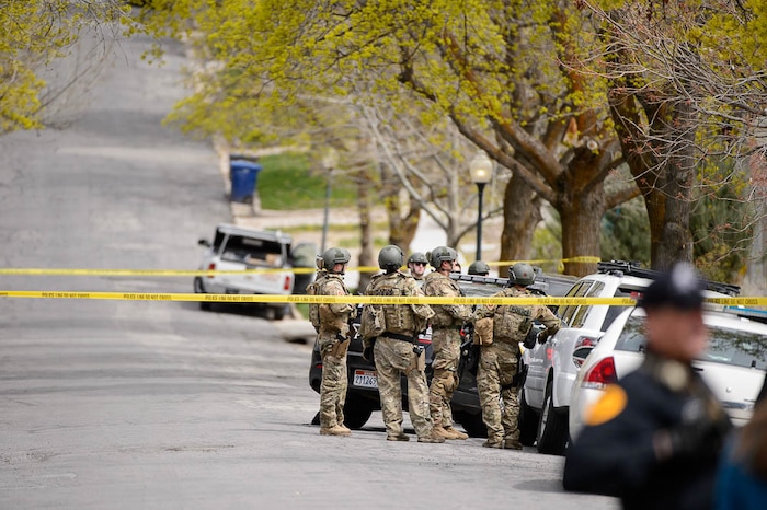 (Trent Nelson | The Salt Lake Tribune)  
Law enforcement at the scene after an incident where a man barricaded himself in a house on Princeton Avenue near 1100 East in Salt Lake City, Wednesday April 18, 2018.