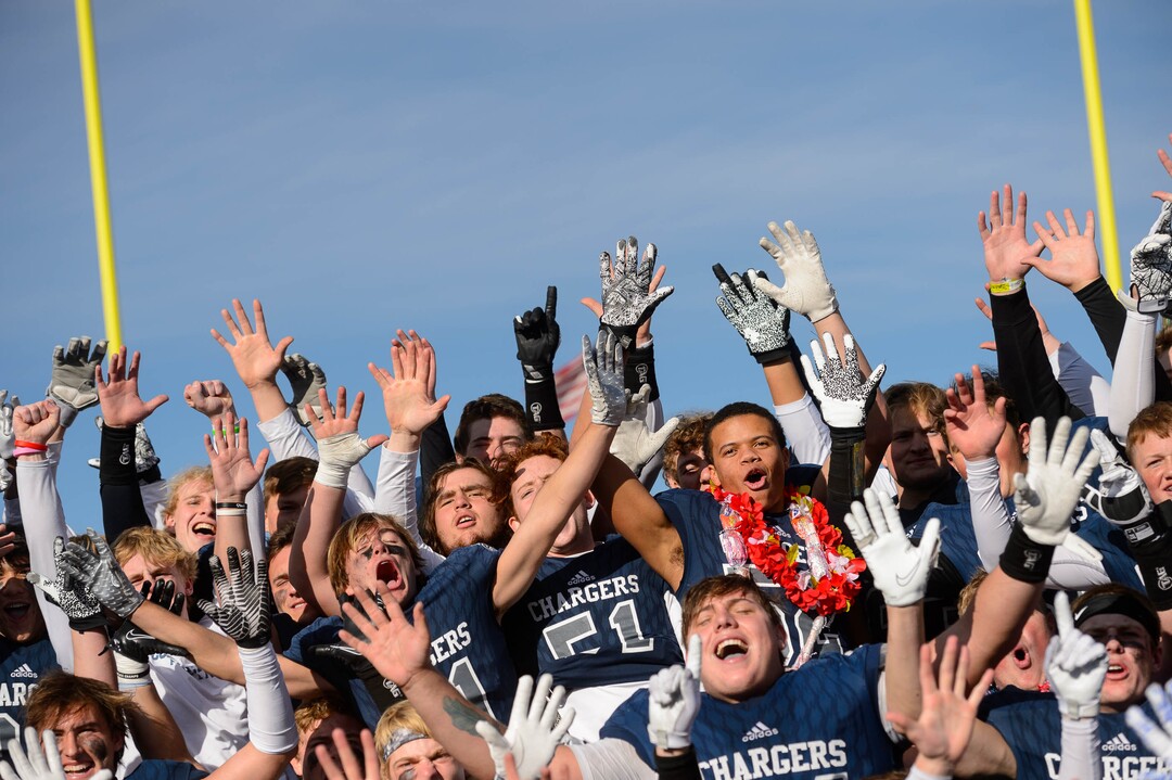 (Trent Nelson  |  The Salt Lake Tribune) Corner Canyon celebrates after the 6A state football championship game against Lone Peak at Cedar Valley High School in Eagle Mountain on Friday, Nov. 20, 2020.