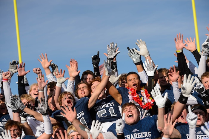(Trent Nelson  |  The Salt Lake Tribune) Corner Canyon celebrates after the 6A state football championship game against Lone Peak at Cedar Valley High School in Eagle Mountain on Friday, Nov. 20, 2020.