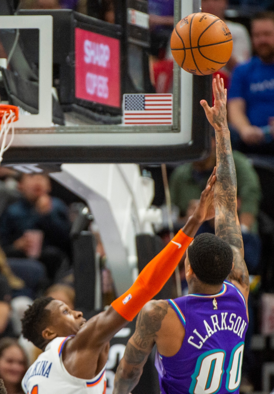 (Rick Egan  |  The Salt Lake Tribune)  Utah Jazz guard Jordan Clarkson (00) shoots overNew York Knicks guard Frank Ntilikina (11), in NBA action between the Utah Jazz and the New York Knicks, in Salt Lake City, Wednesday, Jan. 8, 2020.