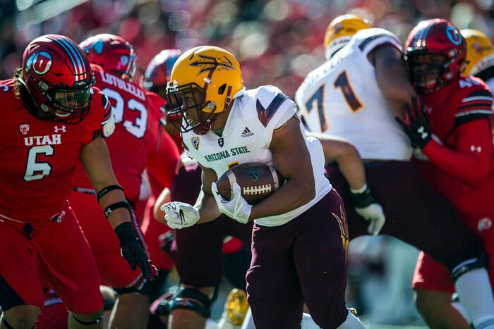 (Chris Detrick  |  The Salt Lake Tribune)  Arizona State Sun Devils running back Demario Richard (4) runs past Utah Utes defensive end Bradlee Anae (6) during the game at Rice-Eccles Stadium Saturday, October 21, 2017. 