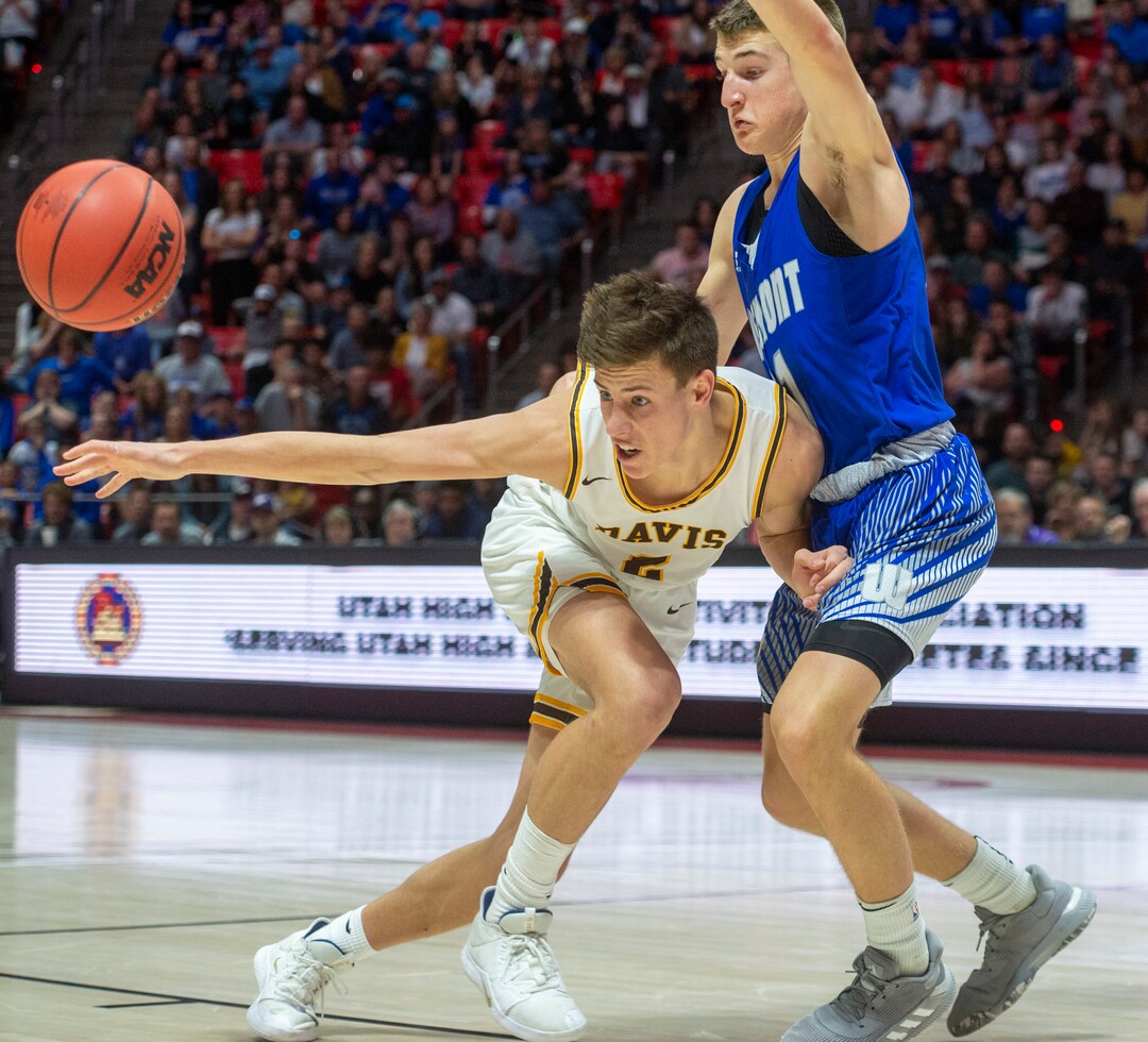 (Rick Egan  |  The Salt Lake Tribune)   Davis High forward Spencer Vernon (2) runs into Fremont Silverwolves Tige Voorhees (11), in the 6A championship game at the Jon M. Huntsman Center, Saturday Feb. 29, 2020