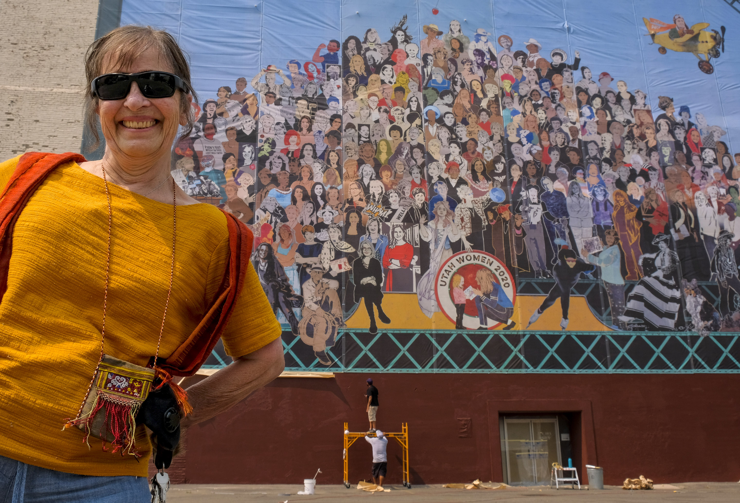 (Leah Hogsten  |  The Salt Lake Tribune) Jann Haworth poses in front of the new "Utah Women 2020" mural, on August 21, 2020. The mural was unveiled on the Dinwoody Building Aug. 26, 2020, in honor of the suffrage milestones this year. The 5,000-square-foot mural was created by Jann Haworth and Alex Johnstone.