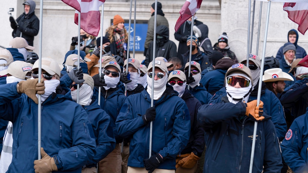 Members of the white supremacist group Patriot Front demonstrate near the National Archives in Washington, Friday, Jan. 21, 2022. Police say 31 members of the group were charged with conspiracy to riot on Saturday in Coeur d’Alene, Idaho. ( AP Photo/Jose Luis Magana)
