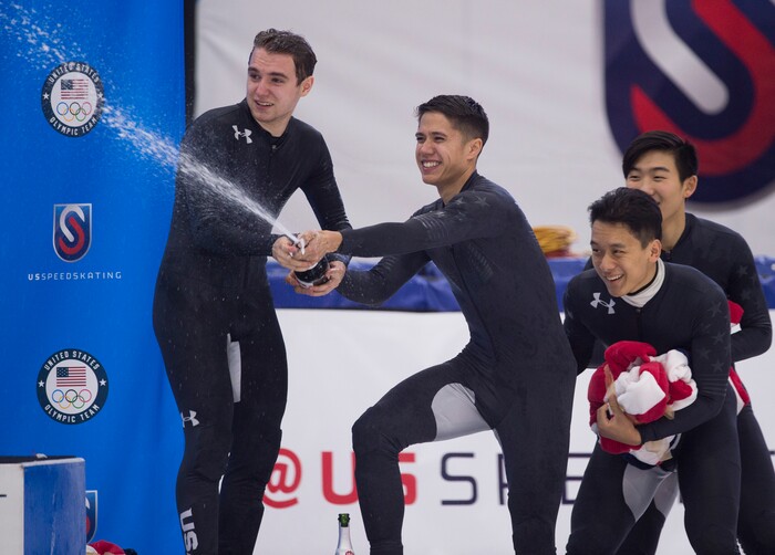 (Scott Sommerdorf   |  The Salt Lake Tribune)   
USA short track Olympians Ryan Piviratto, left, J.R. Celski, Aaron Tran, Thomas Insuk Hong, right, celebrate with champagne after winning their way onto the Us Olympic team on day 3 of the U.S. short-track Olympic Team Trials at the Utah Olympic Oval, Sunday, December 17, 2017.  
