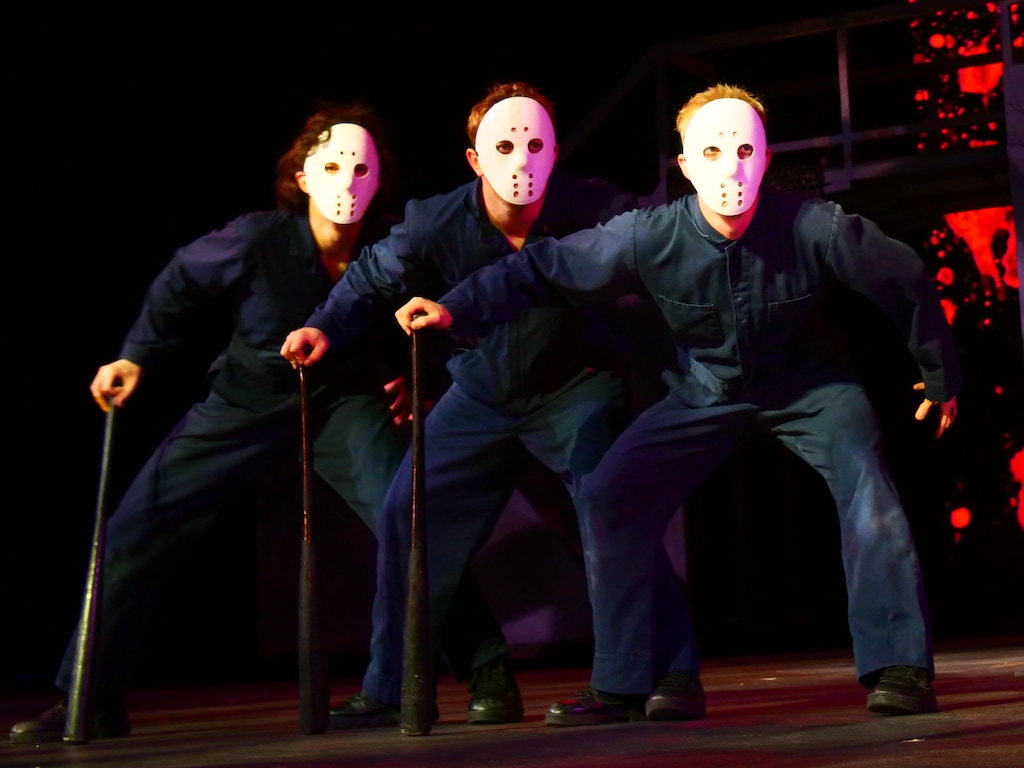 (Odyssey Dance Theatre) Dancers don "Friday the 13th" masks in one of the numbers from Odyssey Dance Theatre's annual Halloween spectacular, "Thriller."