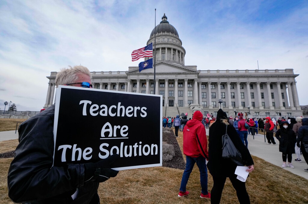 (Francisco Kjolseth | The Salt Lake Tribune) Curtis Benjamin joins educators, parents and other public school advocates as they rally on the steps of the Utah Capitol on Tuesday, Feb. 22, 2022. Advocates feel many anti-public school measures have been made by the Legislature this year.
