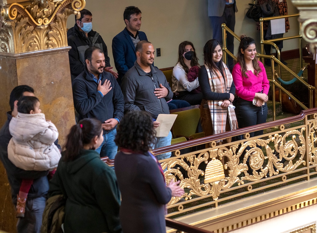 (Rick Egan | The Salt Lake Tribune)  Afghan refugees stand in the gallery of the House of Representatives, as they are introduced by Carol Spackman Moss, during "Afghan Day on the Hill" on Wednesday, Feb. 23, 2022.