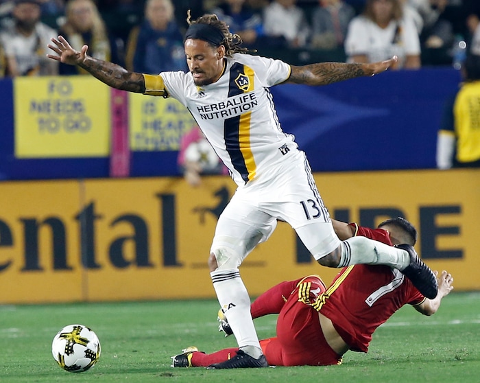Los Angeles Galaxy midfielder Jermaine Jones (13) takes the ball away from Real Salt Lake forward Jefferson Savarino (7) during the first half of an MLS soccer game in Carson, Calif., Saturday, Sept. 30, 2017. (AP Photo/Alex Gallardo)
