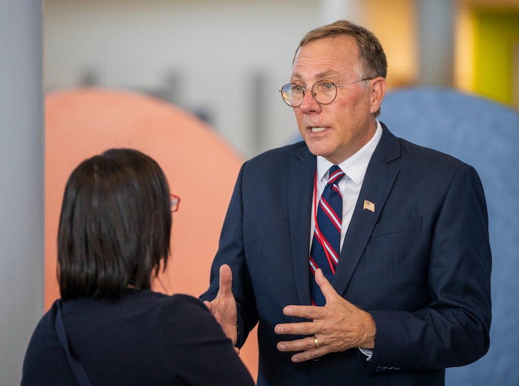 (Rick Egan | The Salt Lake Tribune) Bill Hoster visits with supporters before the GOP 2nd district debate, at Woods Cross High School, onTuesday, June 20, 2023.