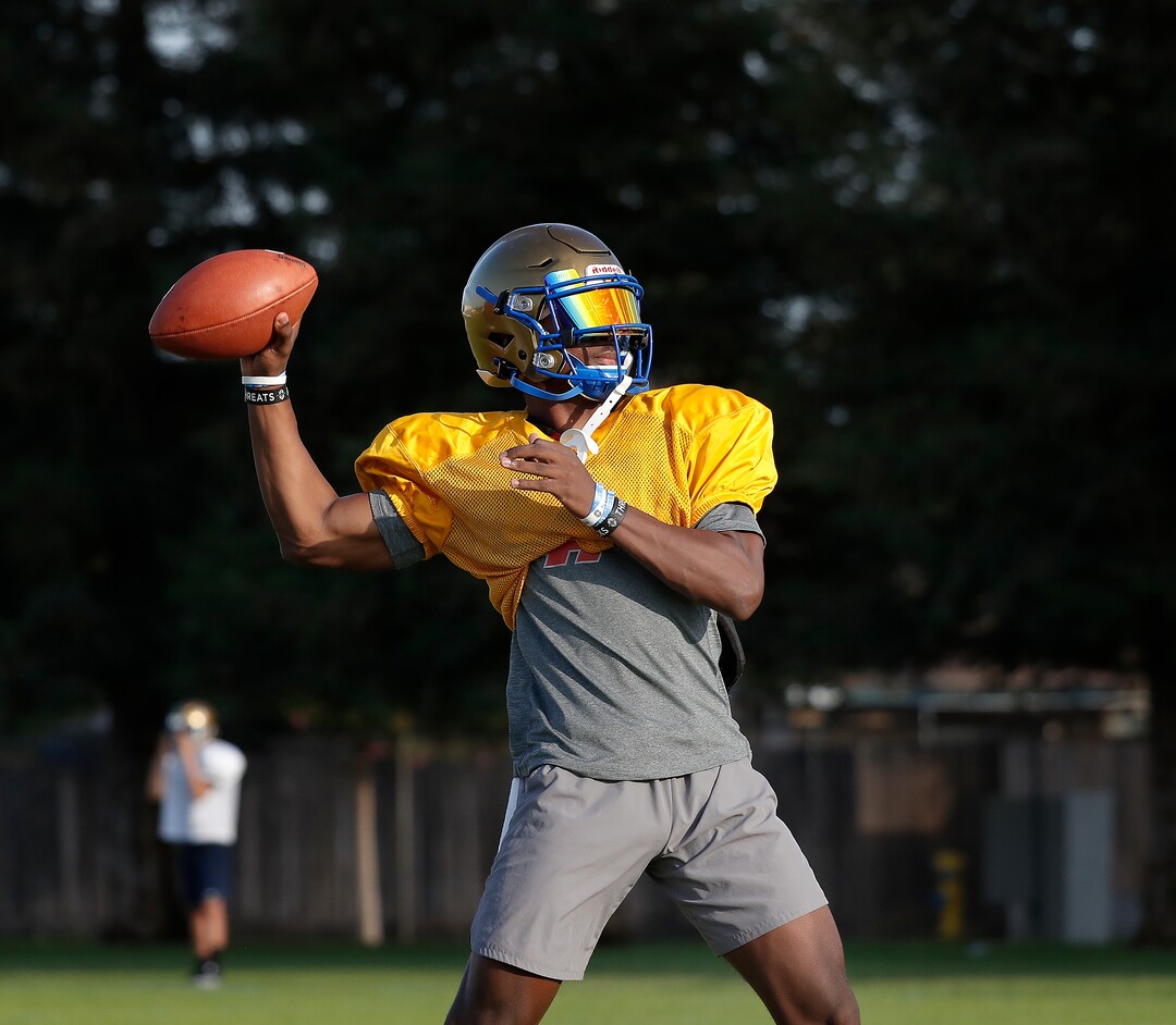 (Gary Kazanjian | Special to The Tribune) Clovis High School quarterback Nate Johnson works out with his team at Clovis High School, who committed to play for the University of Utah, shown Wednesday, July 28, 2021, in Clovis, Calif.