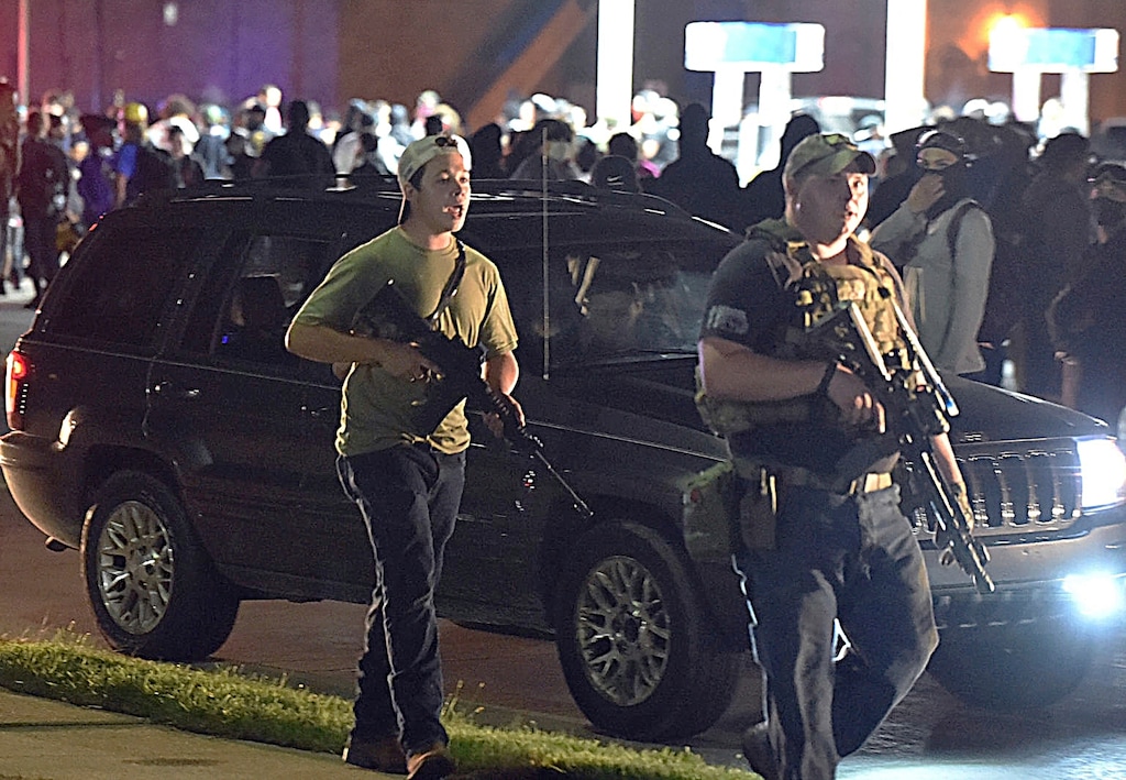 (Adam Rogan | The Journal Times via AP)

In this Aug. 25, 2020, file photo, Kyle Rittenhouse, left, with backwards cap, walks along Sheridan Road in Kenosha, Wis., with another armed civilian.