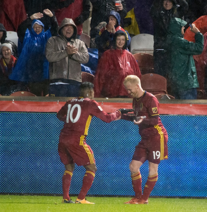 (Rick Egan  |  The Salt Lake Tribune)  Real Salt Lake midfielder Luke Mulholland (19) celebrates by doing a dance with Real Salt Lake forward Joao Plata (10), after scoring a goal, in MLS soccer action, Real Salt Lake vs Seattle Sounders, in Sandy, Saturday, September 23, 2017.