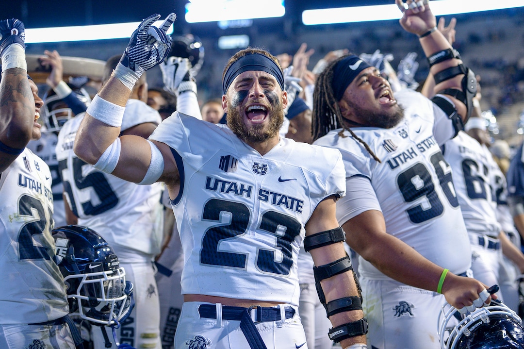 Leah Hogsten  |  The Salt Lake Tribune   Utah State Aggies celebrate the win after defeating BYU, 45-20, at Lavell Edwards Stadium in Provo, Friday, Oct. 5, 2018.