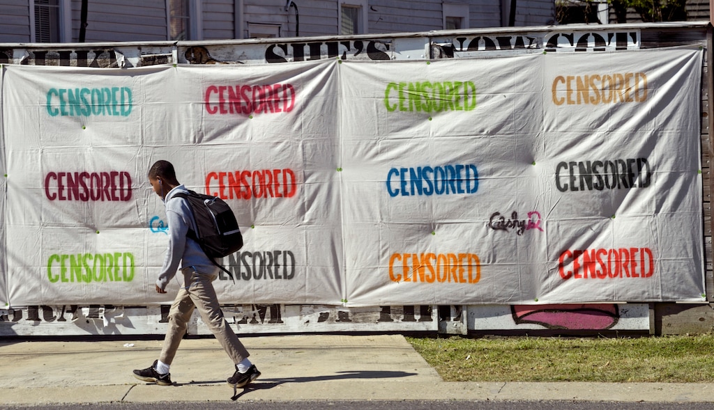 (Max Becherer | The Advocate via AP)
In this March 13, 2018, photo, a sheet with the words "censored" on it covers an anti-trump mural along the 3500 block of S. Liberty Street in New Orleans, La. Landowner Neal Morris sued after being ordered to remove the mural, which transcribes part of then-presidential candidate Trump's recorded "Access Hollywood" conversation, including a boast about groping women's genitals