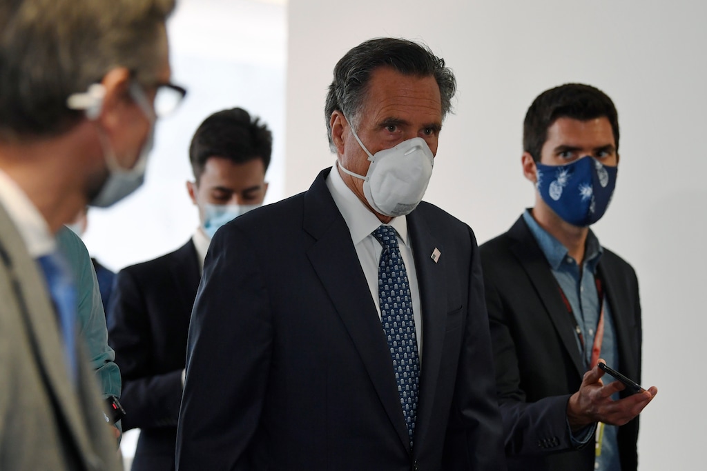 (AP Photo/Susan Walsh) Sen. Mitt Romney, R-Utah, talks to reporters as he arrives for the weekly Republican policy luncheon on Capitol Hill in Washington, Tuesday, June 9, 2020.