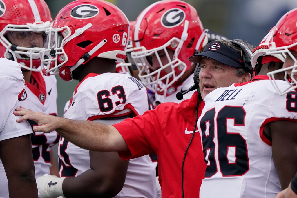 Georgia head coach Kirby Smart gives instruction to his players in the second half of an NCAA college football game against Vanderbilt, Saturday, Oct. 14, 2023, in Nashville, Tenn. (AP Photo/George Walker IV)