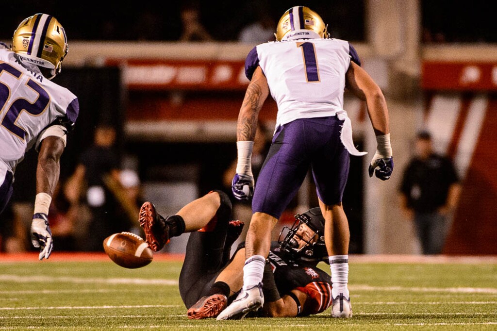 (Trent Nelson | The Salt Lake Tribune)
Utah Utes wide receiver Britain Covey (18) is hit hard by Washington Huskies defensive back Byron Murphy (1) as the University of Utah hosts Washington at Rice-Eccles Stadium in Salt Lake City, Saturday Sept. 15, 2018.