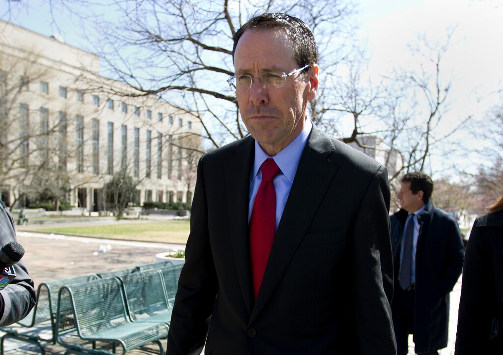 (AP Photo/Jose Luis Magana) In this March 22, 2018 file photo, AT&T CEO Randall Stephenson leaves the federal courthouse in Washington.  Stephenson says the company made a “big mistake” in hiring President Donald Trump’s attorney Michael Cohen as a political consultant.  In an internal memo to employees, obtained by The Associated Press, Friday, May 11, Stephenson called the hiring a "serious misjudgment,'" and said that the company's chief lobbyist in Washington is leaving.