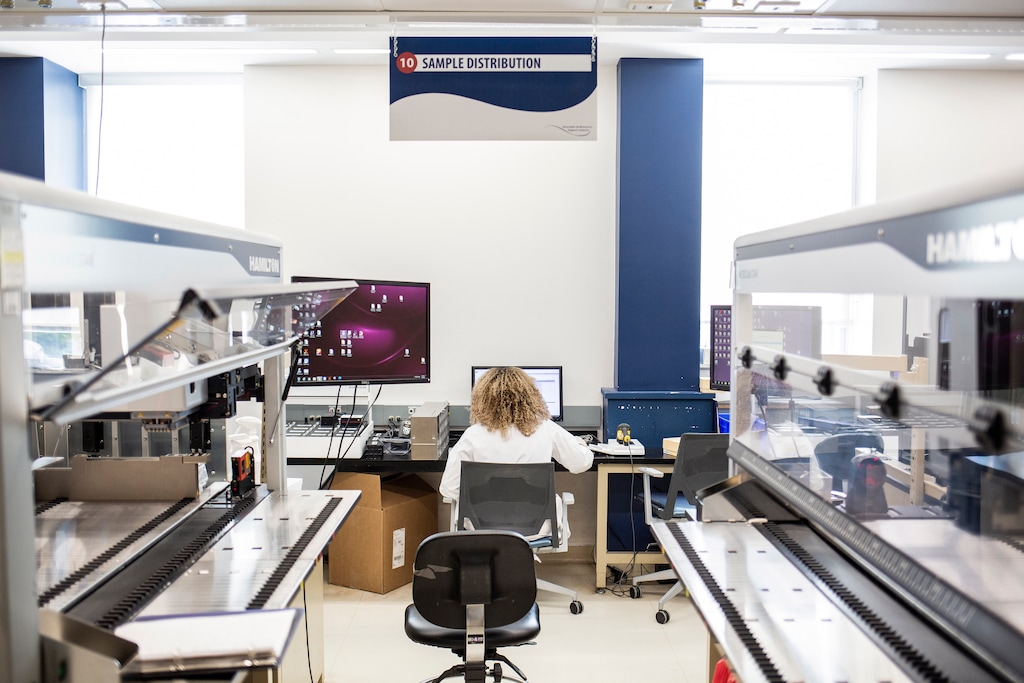 (Bryan Anselm | The New York Times) A technician at work at RUCDR Infinite Biologics in Piscataway, N.J., July 2, 2020. The lab developed a saliva kit that is now a key part of MLB's plan to return to play, and has also been used by other sports leagues that have come back to life, including the PGA Tour and MLS.