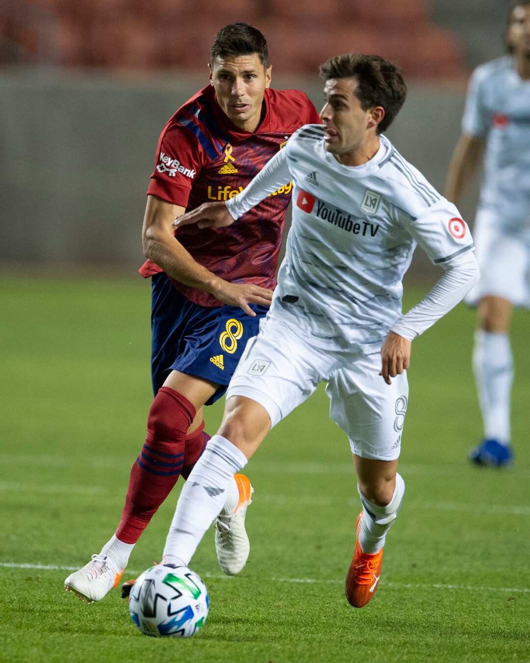 (Rick Egan  |  The Salt Lake Tribune).  Los Angeles FC midfielder Francisco Ginella (8) brings the ball downfield as Real Salt Lake midfielder Damir Kreilach (8) defends, in MLS soccer action between Real Salt Lake and Los Angeles FC at Rio Tinto Stadium, on Wednesday, Sept. 9, 2020.