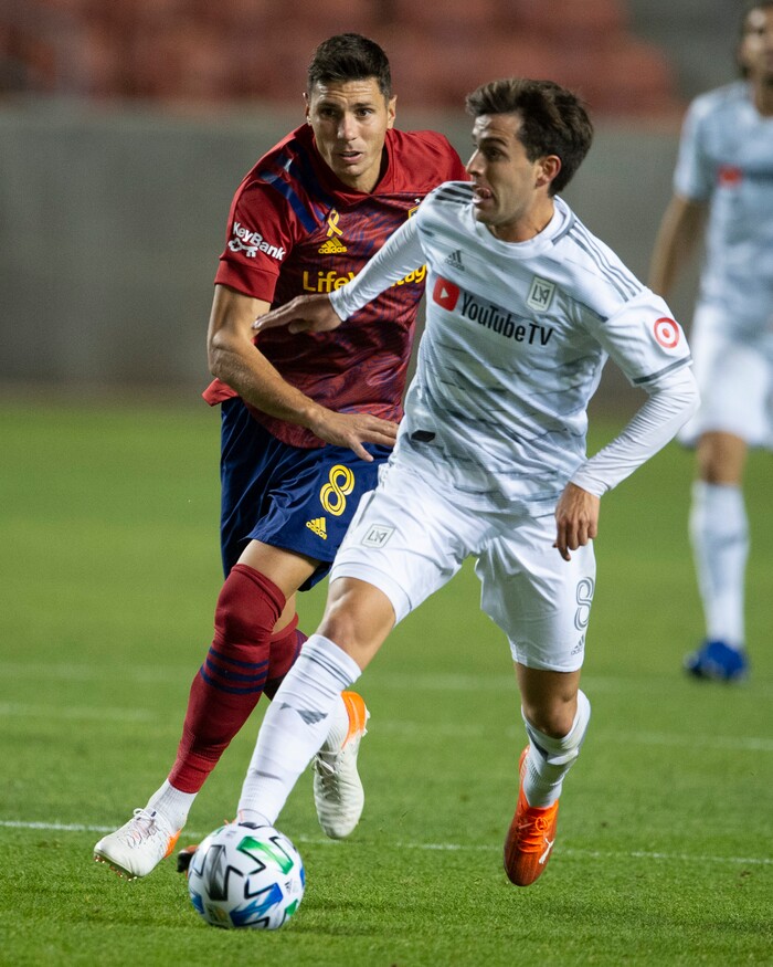 (Rick Egan  |  The Salt Lake Tribune).  Los Angeles FC midfielder Francisco Ginella (8) brings the ball downfield as Real Salt Lake midfielder Damir Kreilach (8) defends, in MLS soccer action between Real Salt Lake and Los Angeles FC at Rio Tinto Stadium, on Wednesday, Sept. 9, 2020.



