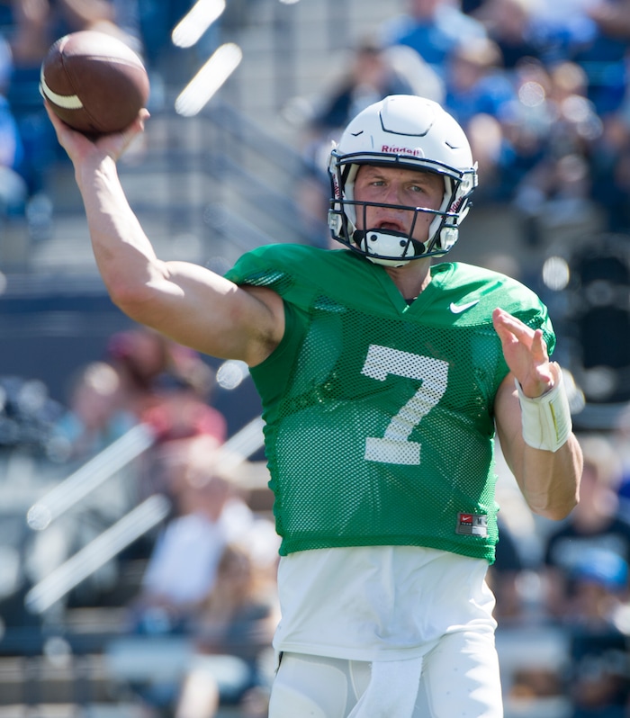 (Rick Egan  |  The Salt Lake Tribune)  BYU quarterback, Beau Hoge (7) runs the offense during  a BYU public scrimmage at Lavell Edwards Stadium, Thursday, August 17, 2017.