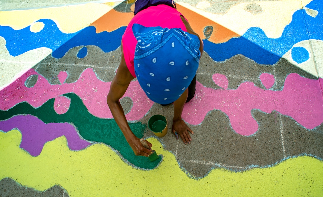 (Rick Egan  |  The Salt Lake Tribune)    Katlyn Addison works on the Black Lives Matter mural, on the south side of Salt Lake City Hall on Tuesday, Aug. 4, 2020.