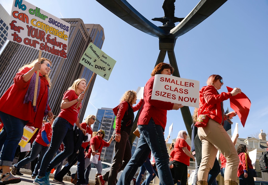 (Leah Hogsten | Tribune file photo) This Feb. 28, 2020, file photo shows teachers in the Salt Lake City School District during a walkout and march from downtown Salt Lake City to the state Capitol to protest teacher pay in an effort to pressure the Utah State Legislature as it decides how much money it will allocate to the state’s education system. A bill scheduled for public hearing Thursday would change the state constitution's earmark to allow income tax revenue to be spent on noneducation programs.
