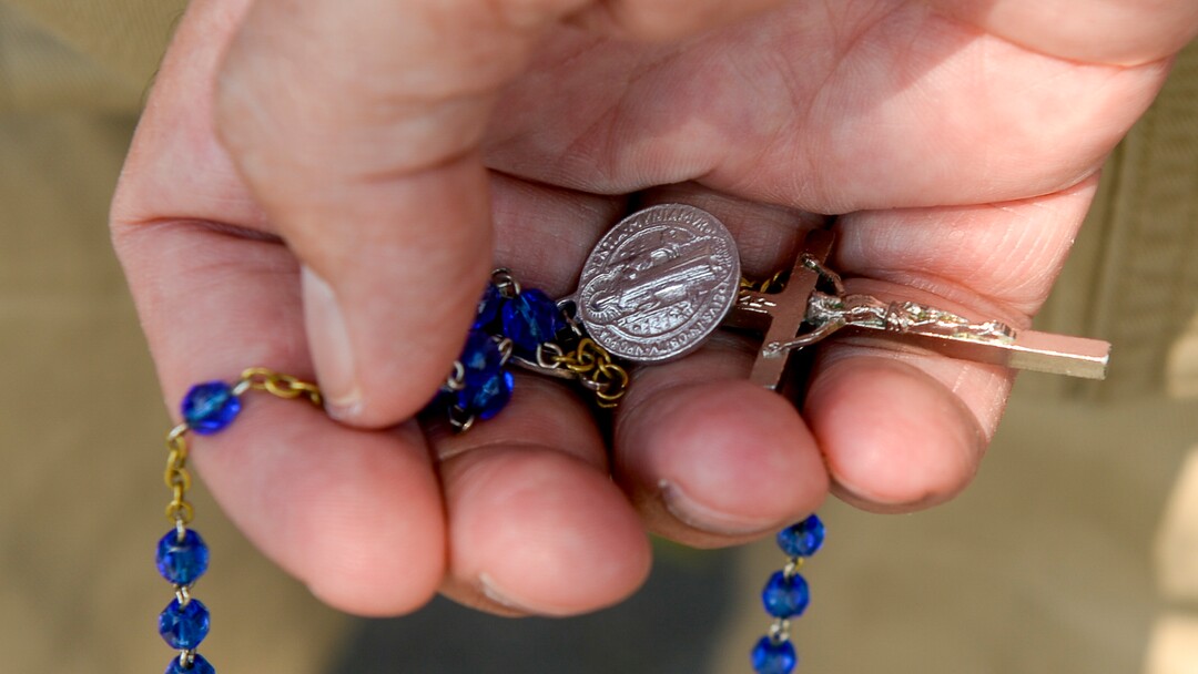 Leah Hogsten  |  The Salt Lake Tribune   Catholic priest, Rev. Jan Bednarz of St. Martin de Porres Parish in Taylorsville, leads the "blessed sacrament" and exorcism at the Planned Parenthood offices on the Feast of the Assumption. Bednarz was joined by the group, "40 Days for Life Utah," to protest Planned Parenthood. 