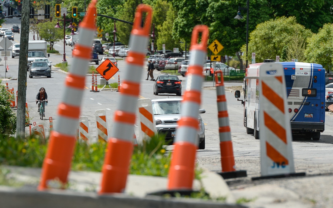 (Francisco Kjolseth  |  The Salt Lake Tribune)  Traffic moves along a sea of orange as plans to repurpose 29 parking spaces between 950 East and 1300 East on 900 South in Salt Lake City causes some frustration from business owners and residents in the area.