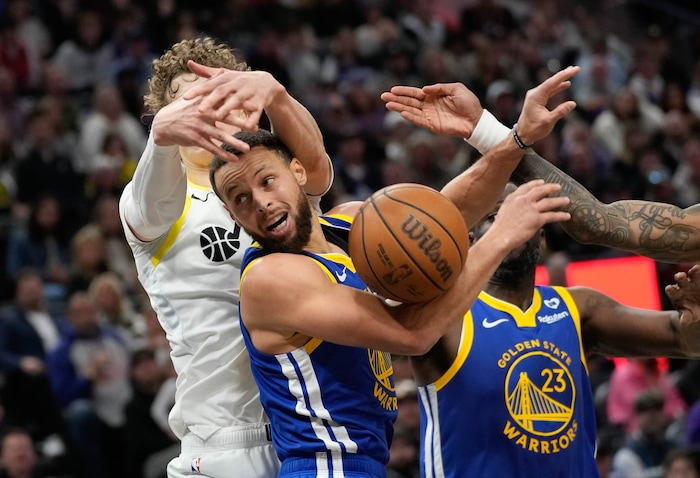 (Francisco Kjolseth  |  The Salt Lake Tribune) Golden State Warriors guard Stephen Curry (30) faces stiff defense from the Jazz during an NBA basketball game Thursday, Feb. 15, 2024, in Salt Lake City.