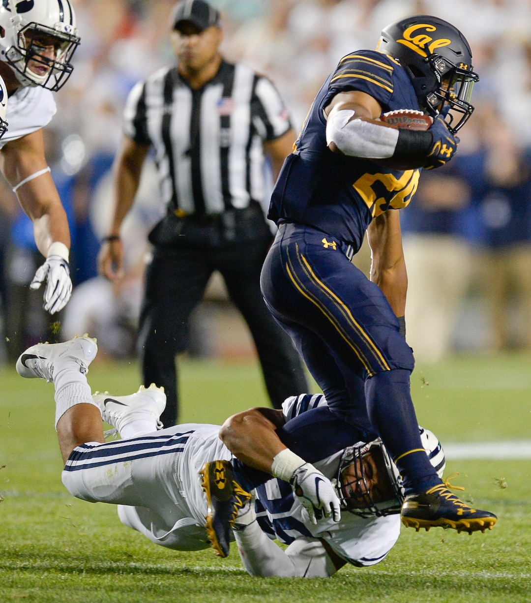 (Francisco Kjolseth  |  The Salt Lake Tribune)  Brigham Young Cougars linebacker Butch Pau'u (38) takes down California Golden Bears running back Marcel Dancy (29) during the first half of the NCAA college football game, Saturday, Sept. 8, 2018, at LaVell Edwards stadium in Provo, Utah.