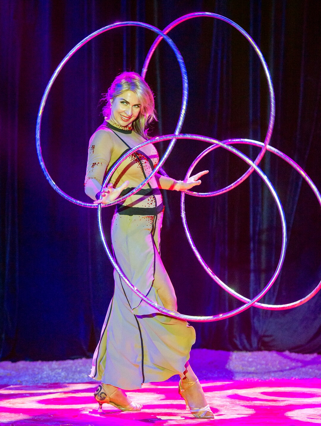 (Rick Egan  |  The Salt Lake Tribune)  Russian hula hoop artist ,Alesya Gulevich, performs at the Big Top Circus Spectacular, at the Utah State Fair, Sunday, Sept. 8, 2019.