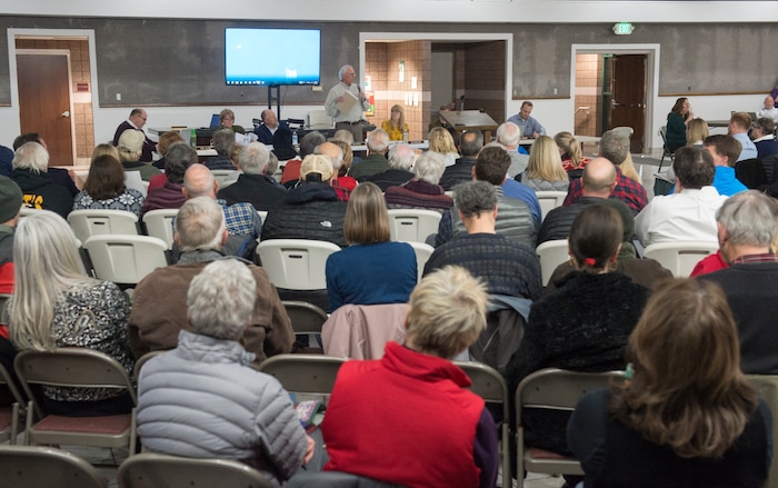 (Rick Egan  |  The Salt Lake Tribune)  Hundreds of concerned citizens gather at the St Vincent De Paul Catholic School for a public hearing about the developers plans for the old Cottonwood Mall site. Wednesday, December 13, 2017.


