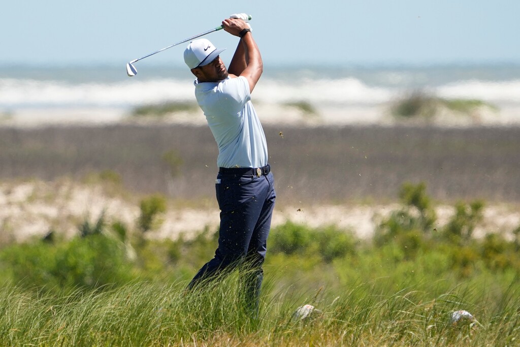 (David J. Phillip | AP) Tony Finau watches his tee shot on the eighth tee during the first round of the PGA Championship golf tournament on the Ocean Course Thursday, May 20, 2021, in Kiawah Island, S.C.