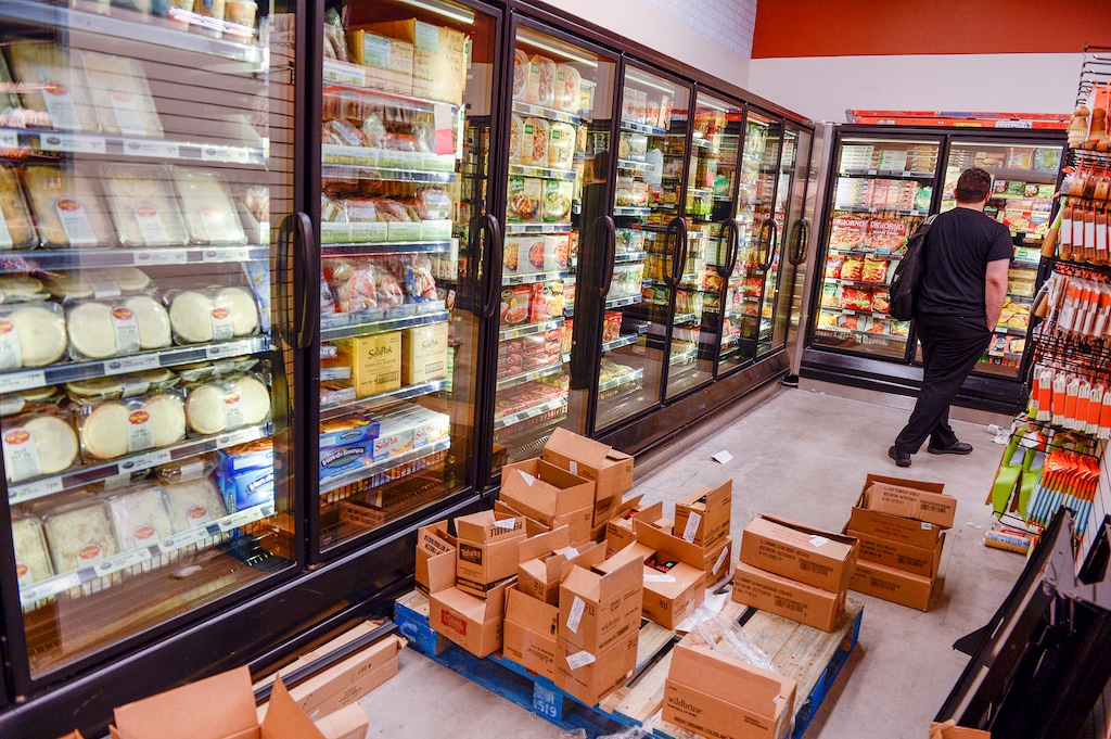 (Leah Hogsten | The Salt Lake Tribune) Food brokers and vendors stock The Store, August 21, 2019.