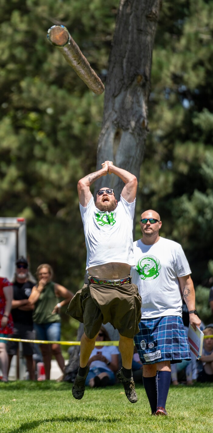 (Rick Egan | The Salt Lake Tribune) Dan Eccles, from West Jordan, competes in the Caber Toss in the Highland games competition, at the Payson Scottish Festival, on Saturday, July 9, 2022.
