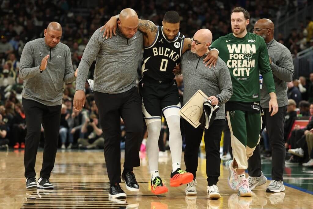 (Getty Images via The Athletic)
The Milwaukee Bucks' Damian Lillard is helped off the court after suffering a torn Achilles tendon during a game against the Indiana Pacers on Sunday, April 27, 2025, in Milwaukee.