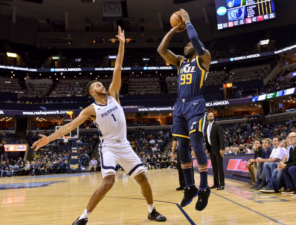 Utah Jazz forward Jae Crowder (99) shoots against Memphis Grizzlies forward Kyle Anderson (1) in the first half of an NBA basketball game Monday, Nov. 12, 2018, in Memphis, Tenn. (AP Photo/Brandon Dill)