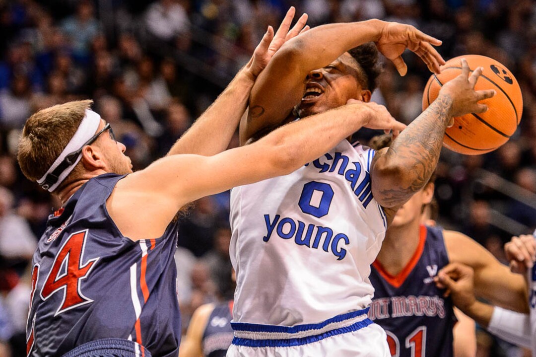 (Trent Nelson | The Salt Lake Tribune)   Brigham Young Cougars guard Jahshire Hardnett (0) defended by St. Mary's Gaels forward Calvin Hermanson (24) as BYU hosts the St. Mary's Gaels, NCAA basketball in Provo, Saturday December 30, 2017.
