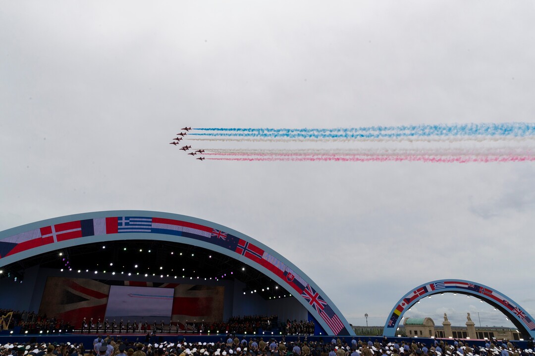 (Alex Brandon | AP) A flyover trails colored smoke to conclude a ceremony to mark the 75th Anniversary of D-Day, when the Allied soldiers, sailors and airmen conducted an invasion that helped liberate Europe from Nazi Germany, Wednesday, June 5, 2019, in Portsmouth, England.